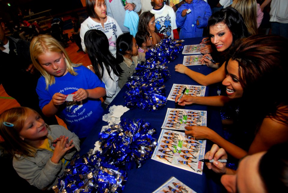 US Navy 071127-N-6936D-267 Members of the Orlando Magic Dancers sign autographs for Sasebo Sailors and their families during the Pacific-leg of an Armed Forces Entertainment tour