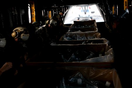 US Navy 071127-N-5642P-047 Medical response team members from USS Kearsarge (LHD 3) strap into their seats aboard a CH-53E Sea Stallion helicopter