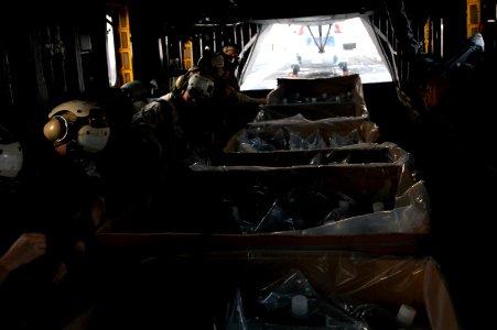 US Navy 071127-N-5642P-047 Medical response team members from USS Kearsarge (LHD 3) strap into their seats aboard a CH-53E Sea Stallion helicopter photo