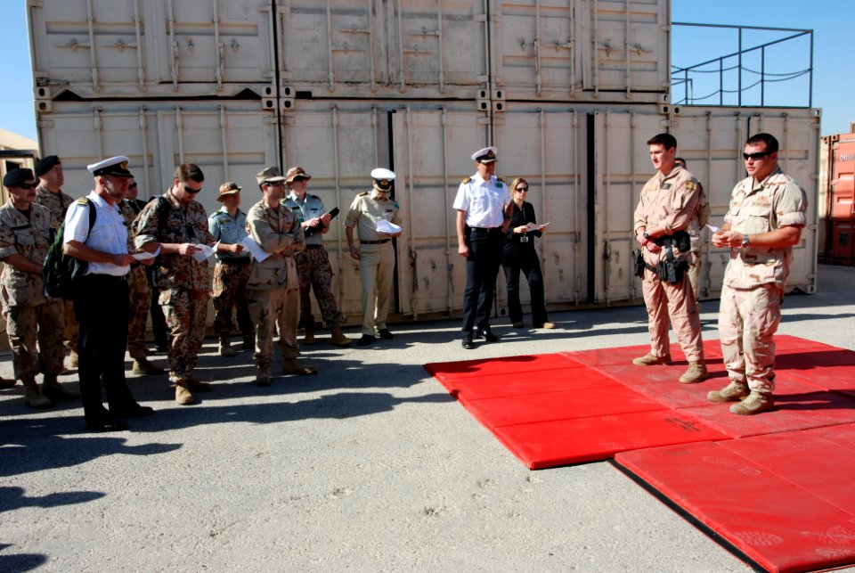 US Navy 071128-N-7095C-002 MR3 Jason Schmitz and IT2 Brendan Dunn demonstrate techniques used by Coast Guard boarding teams on patrol in the 5th Fleet area of responsibility