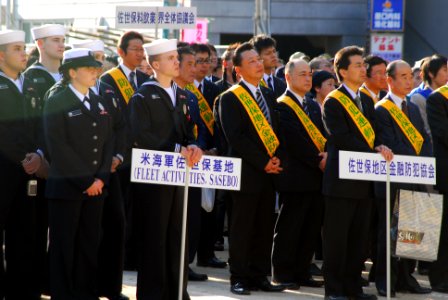 US Navy 071130-N-6936D-024 Sailors from Fleet Activities Sasebo security department observe the opening ceremony of an annual Peace and Safety Parade, as they prepare to join 750 local citizens to march through the streets of t
