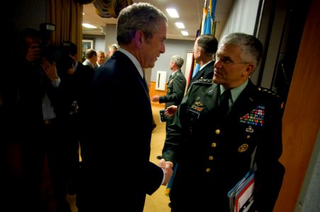 US Navy 071129-N-0696M-233 President George W. Bush shakes the hand of Gen. George W. Casey, U.S. Army chief of staff, at the conclusion of a meeting with senior leaders discussing long-term strategic plans for the military