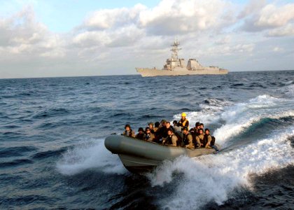 US Navy 071202-N-2838W-014 The guided-missile destroyer USS Bulkeley's (DDG 84) visit, boarding, search and seizure (VBSS) team prepares to come aboard training support vessel Prevail (TSV 1)