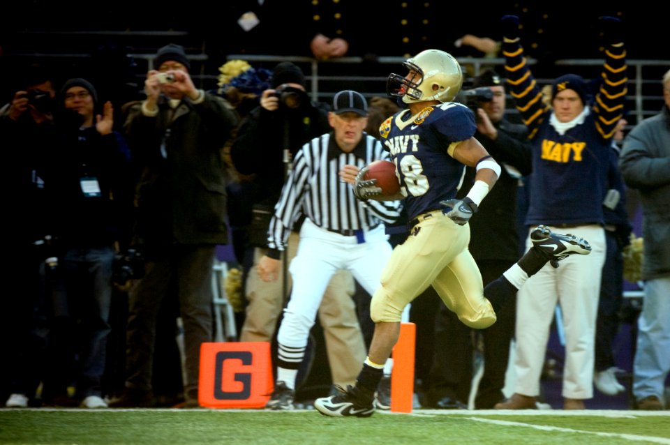 US Navy 071201-N-0696M-391 U.S. Naval Academy senior slot back Zerbin Singleton (28) completes the first of five Navy touchdowns