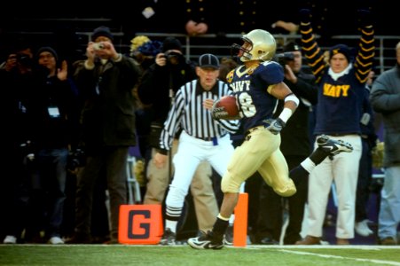 US Navy 071201-N-0696M-391 U.S. Naval Academy senior slot back Zerbin Singleton (28) completes the first of five Navy touchdowns