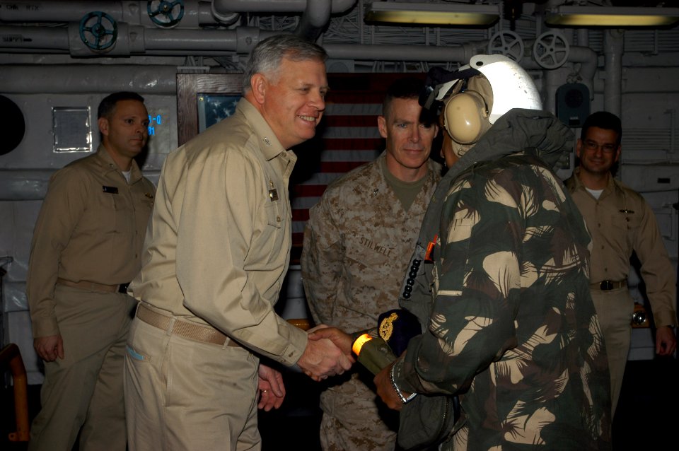 US Navy 071129-N-5642P-005 Capt. James Gregorski, Commanding Officer, amphibious assault ship USS Kearsarge (LHD 3), greets a foreign military officer in the flight deck triage area for a distinguished visit