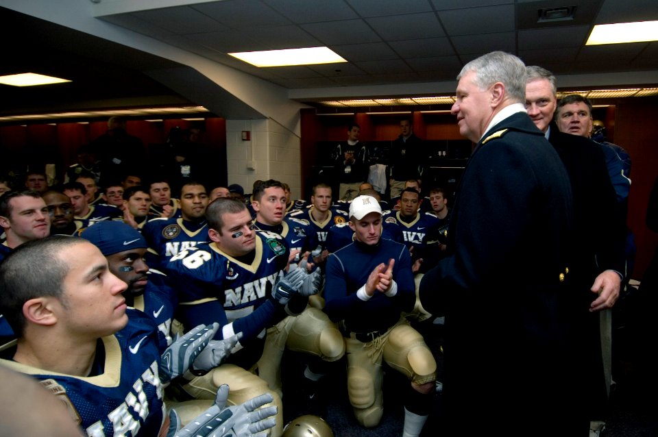 US Navy 071201-N-8273J-230 Chief of Naval Operations (CNO) Adm. Gary Roughead congratulates the U.S. Naval Academy team following a 38-3 victory over the Black Knights of the Army. The 108th Army-Navy football game was held at