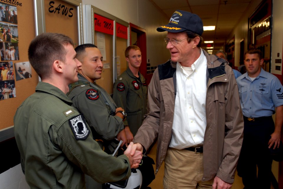 US Navy 071130-N-0486G-004 During a tour of Naval Station Mayport's Helicopter Anti-Submarine Squadron (HSL) 40, Ed Begley Jr. shakes hands with with Lt.j.g Cody Cutlzel