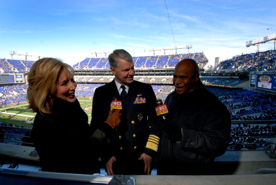 US Navy 071201-N-8273J-011 Chief of Naval Operations (CNO) Adm. Gary Roughead, center, conducts a pre-game interview with Baltimore CBS affiliate WJZ-TV Channel 13, prior to the 108th Army-Navy game at M^T Bank Stadium in Balti