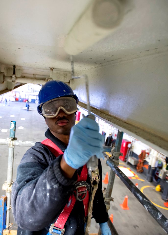 USS Bonhomme Richard (LHD 6) Sailors Painting Around the Ship 170113-N-TH560-026