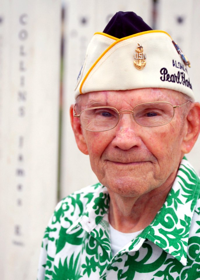 US Navy 071203-N-0879R-002 Pearl Harbor survivor Senior Chief George A. Brown (Ret.) visits the newly built USS Oklahoma Memorial on Ford Island, which is dedicated to the 429 Sailors killed aboard the battleship USS Oklahoma (