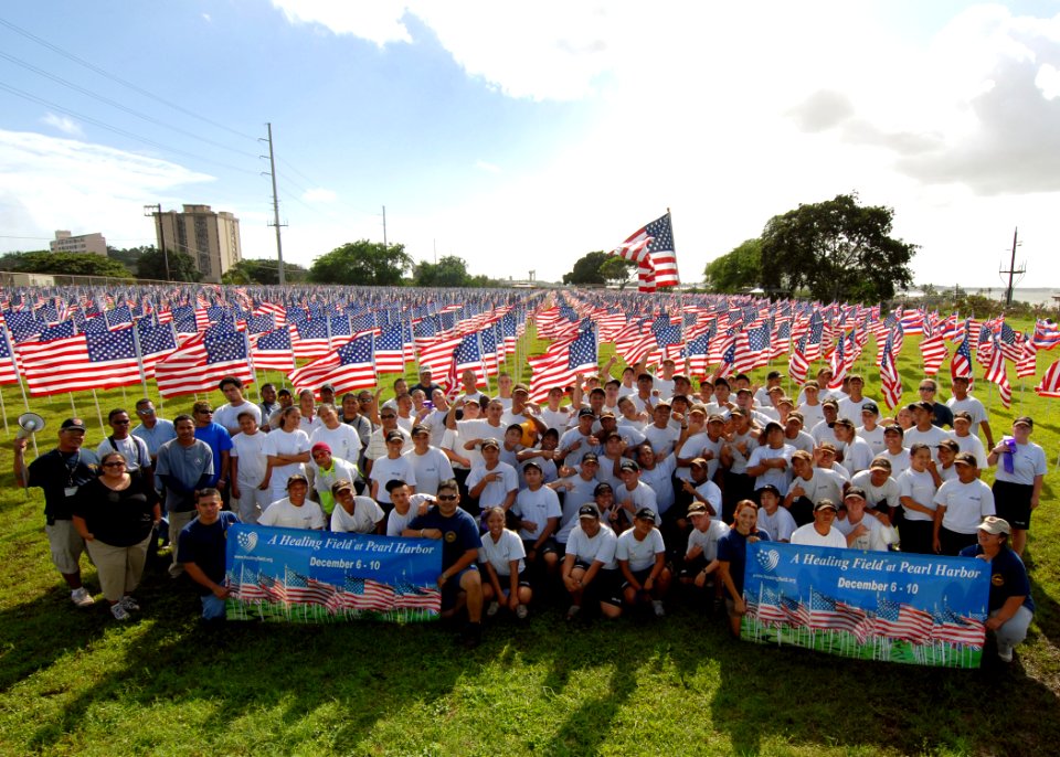 US Navy 071205-N-5476H-044 Students from the Hawaii National Guard Youth Challenge Academy and volunteers from the Hawaii Job Corp pose for a group photo after placing ribbons and flags for the Healing Field Flag Memorial