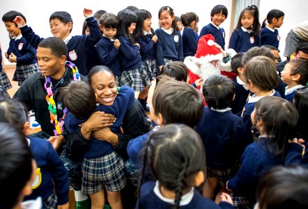 USS Bonhomme Richard (LHD 6) Silors visit Emukae Kindergarten. 161221-N-WF272-253