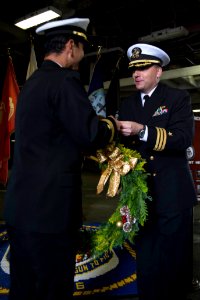 USS Bonhomme Richard (LHD 6) Holiday Gift Exchange with Kurama Executive Officer 161221-N-XT039-526