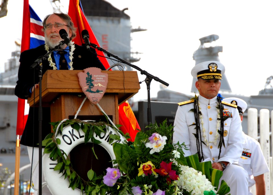 US Navy 071207-N-4965F-029 The Honorable Neil Abercrombie, Representative of Hawaii, delivers his remarks during a joint Oklahoma Memorial Committee-National Park Service dedication ceremony for battleship USS Oklahoma (BB 37)