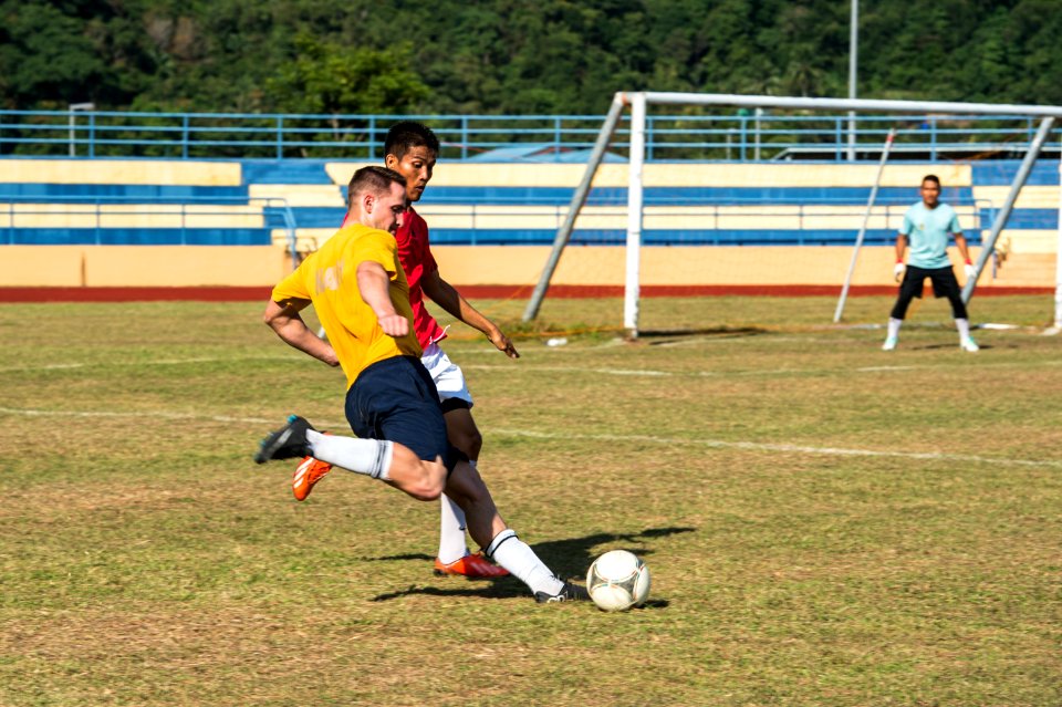 USS Bonhomme Richard sailors play soccer in Malaysia 150224-N-UF697-221