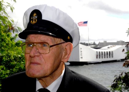 US Navy 071204-N-9758L-028 Pearl Harbor survivor Chief Cook Edward Gaulrapp (Ret.) views the USS Arizona Memorial during a visit to historic Ford Island