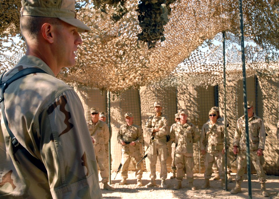 US Navy 071209-N-3857R-002 Naval Mobile Construction Battalion (NMCB) 1 commanding officer, Cmdr. Dean Tufts discusses upcoming operations with his unit