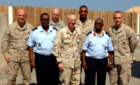 US Navy 071210-N-1003P-001 U.S. Marine Lt. Col. Thomas Foos, Djibouti air force Capt. Abdillahi Hassan, U.S. Navy Capt. John Heckmann Jr., Djibouti air force Col. Aden Dahir and U.S. Marine Maj. Wayne Zuber pose for a photo