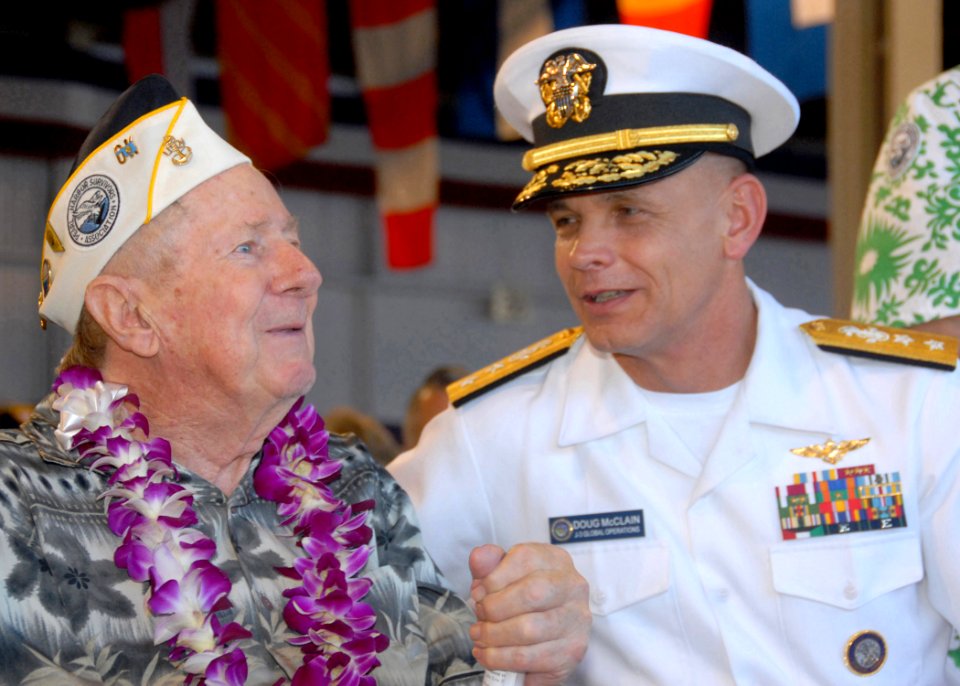 US Navy 071207-N-9758L-040 Rear Adm. Doug McClain, director of global operations, United States Strategic Command, talks to a Pearl Harbor survivor prior to a joint U.S. Navy-National Park Service ceremony