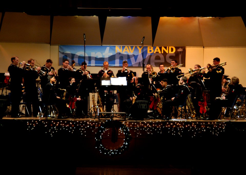 US Navy 071210-N-9860Y-002 Navy Band Northwest (NBNW) Big Band, Cascade, plays Holly and the Ivy - God Rest Ye Merry Gentlemen at the Holly, Jolly Holiday concert held in Parker Hall of Oak Harbor High School