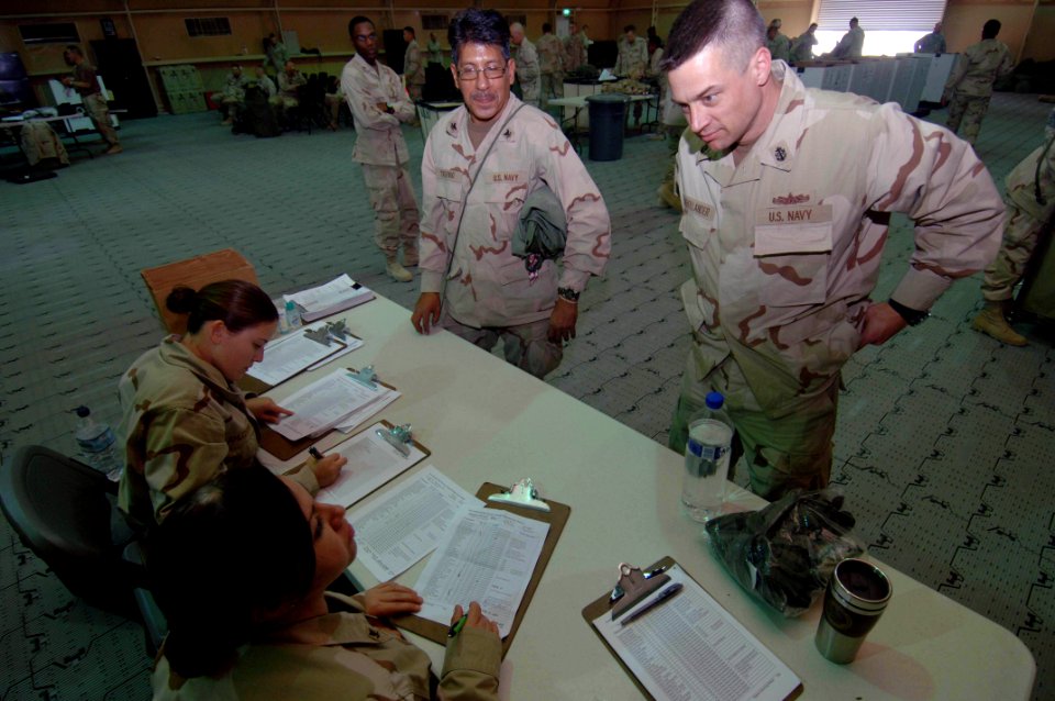 US Navy 071211-N-7027P-106 During the Warrior Transition Program in the Expeditionary Combat Readiness Center (ECRC), Navy individual augmentees have their inventory sheets verified to show that all of their combat gear has bee