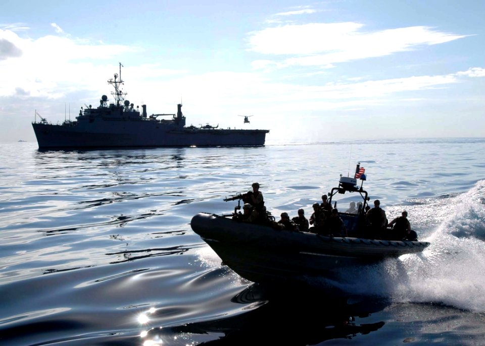 US Navy 071210-N-2838W-029 Amphibious transport dock ship USS Nashville's (LPD 13) visit, boarding, search and seizure team embarks towards the training support vessel Prevail (TSV 1) for a real-time compliant boarding simulati