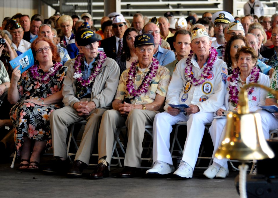 US Navy 071207-N-4965F-012 Pearl Harbor survivors listen to guest speakers during a joint U.S. Navy-National Park Service ceremony commemorating the 66th anniversary of the attack on Pearl Harbor