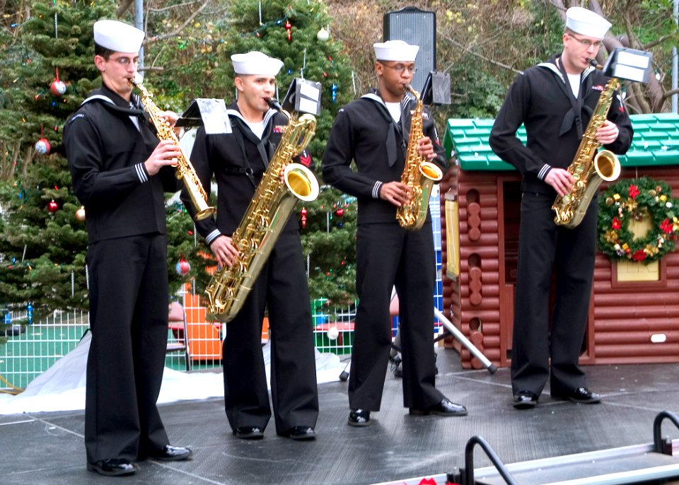 US Navy 071214-N-0483B-002 The 7th Fleet Band Saxophone Quartet played holiday music for the children and staff of the Child Development Center during a
