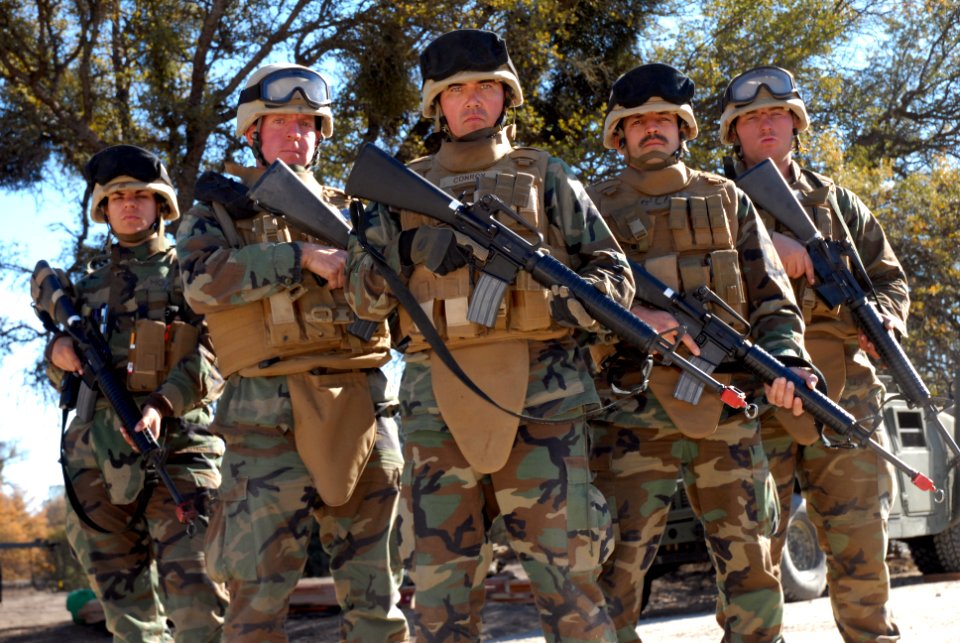 US Navy 071211-N-9623R-010 Seabees attached to Naval Mobile Construction Battalion (NMCB) 17's Convoy Security Element (CSE) stand ready to defend. The CSE team is tasked with the safe movement of convoys to and from their miss