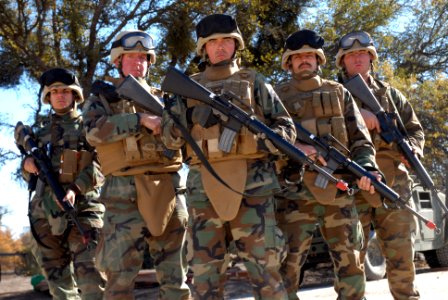 US Navy 071211-N-9623R-010 Seabees attached to Naval Mobile Construction Battalion (NMCB) 17's Convoy Security Element (CSE) stand ready to defend. The CSE team is tasked with the safe movement of convoys to and from their miss