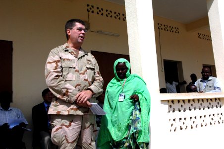 US Navy 071215-N-3931M-023 U.S. Navy Capt. Dennis Gallagher from Combined Joint Task Force-Horn of Africa (CJTF-HOA) addresses the faculty, students and invited guests during the Ali Adde school dedication ceremony