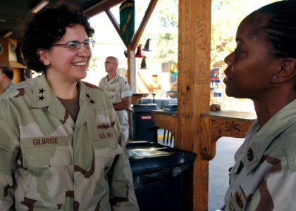 US Navy 071219-N-3285B-116 Rear Adm. Ann Debaets Gilbride, associate director of naval intelligence, speaks with Chief Information Systems Sheria Sanchious