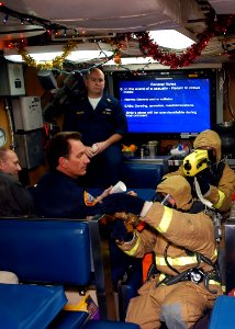 US Navy 071213-N-1226D-196 During a safety brief, Sailors aboard the nuclear-powered attack submarine USS Asheville (SSN 758) demonstrate how the fire party carries out fire-fighting procedures
