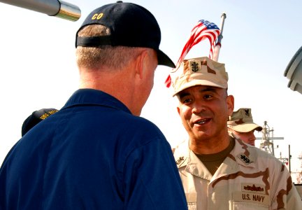 US Navy 071224-N-7095C-001 Master Chief Petty Officer of the Navy (MCPON) Joe R. Campa Jr. speaks with Capt. Michael Jacobsen, commanding officer, USS Hue City (CG 66)
