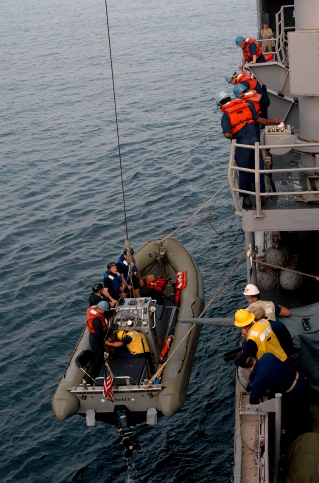 US Navy 071218-N-1831S-049 Crewmembers aboard the guided-missile frigate USS Carr (FFG 52) send a RHIB to recover OSCAR during a man-over drill