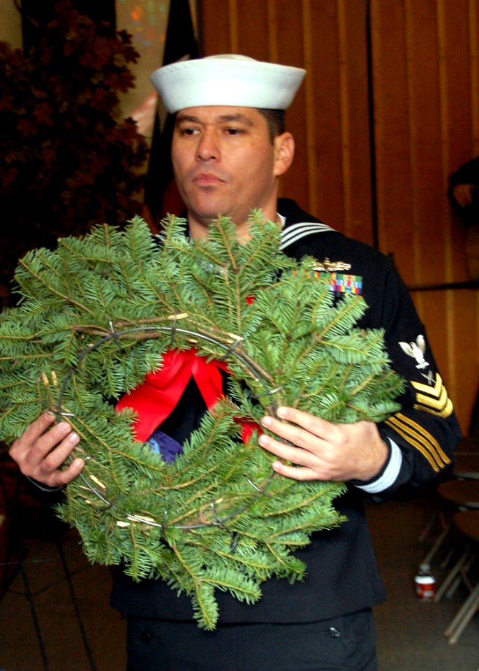 US Navy 071215-N-8390S-007 Yeoman 1st Class Jesus Almaguer, Naval Recruiting District Support Person of the Year, participates in a wreath laying ceremony sponsored by the Houston Civil Air Patrol in conjunction with Wreath Acr