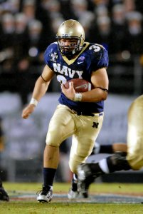 US Navy 071220-N-0555B-066 Navy running back, Reggie Campbell (7), a senior from Sanford, Fla., prepares to catch a pitch from quarterback Kaipo-Noa Keheaku-Enhada (10)