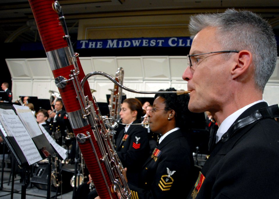 US Navy 071219-N-0773H-016 Chief Musician Michael A. Curtis and Tia F. Wortham perform with the Navy Band at the 61st annual Midwest Clinic