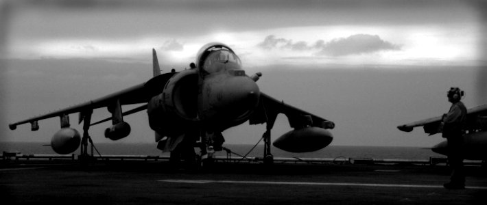 US Navy 071220-N-6597H-121 An AV-8B Harrier tied down to the flight deck of amphibious assault ship USS Tarawa (LHA 1), awaiting the day's flight operations