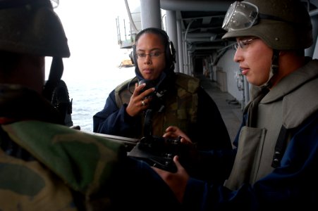 US Navy 071222-N-1831S-005 Watch standers man the .50 cal starboard side gun mount during a general quarters drill aboard amphibious assault ship USS Kearsarge (LHD 3)