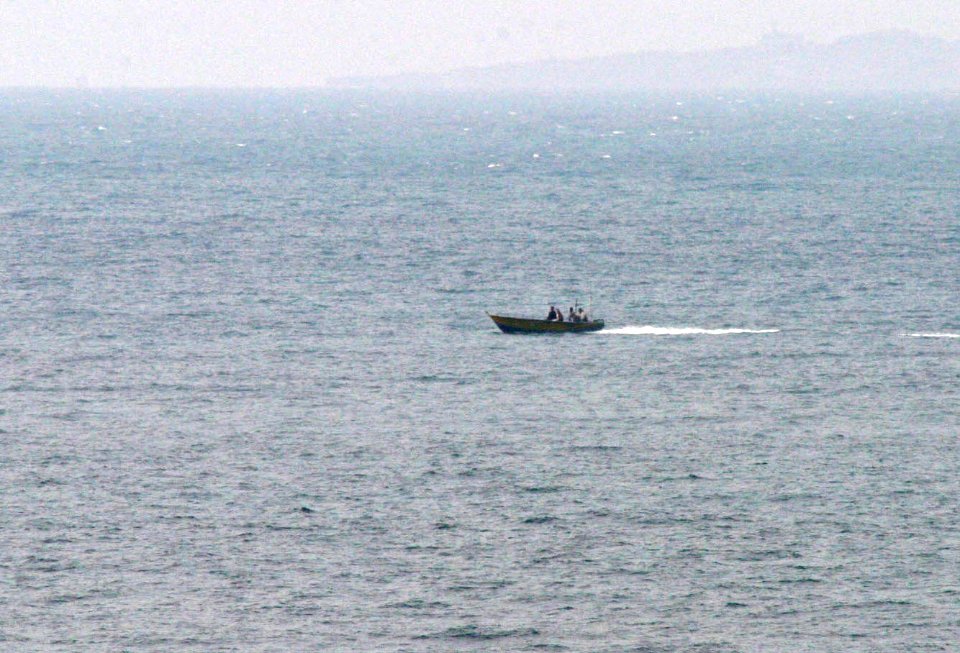 US Navy 080106-N-0000X-002 Small craft suspected to be from the Islamic Republic of Iran Revolutionary Guard Navy (IRGCN), maneuver aggressively in close proximity of U.S. Navy ships