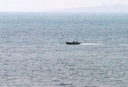 US Navy 080106-N-0000X-002 Small craft suspected to be from the Islamic Republic of Iran Revolutionary Guard Navy (IRGCN), maneuver aggressively in close proximity of U.S. Navy ships