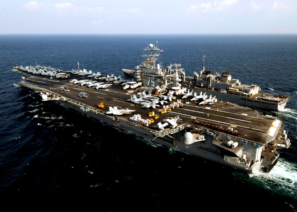 US Navy 080106-N-5758H-274 The Nimitz-class nuclear-powered aircraft carrier USS Harry S. Truman (CVN 75) and the Military Sealift Command fast combat support ship USNS Arctic (T-AOE 8) sail side-by-side during a vertical reple