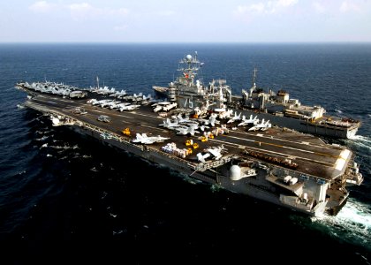 US Navy 080106-N-5758H-274 The Nimitz-class nuclear-powered aircraft carrier USS Harry S. Truman (CVN 75) and the Military Sealift Command fast combat support ship USNS Arctic (T-AOE 8) sail side-by-side during a vertical reple