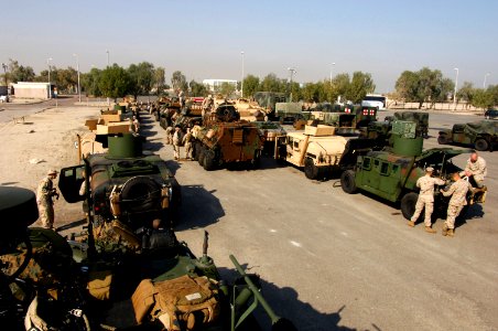 US Navy 080105-N-6597H-323 Vehicles attached to the 11th Marine Expeditionary Unit are brought ashore by landing craft from the amphibious assault ship USS Tarawa (LHA 1)