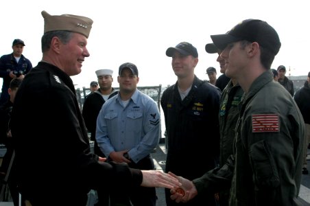 US Navy 080109-N-1655H-001 Adm. Mark Fitzgerald, Commander, Naval Forces Europe congratulates Search and Rescue (SAR) swimmers aboard the guided missile cruiser USS San Jacinto (CG 56)