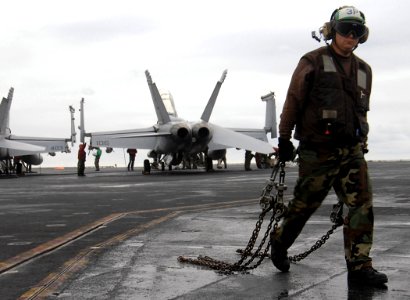 US Navy 080104-N-7364R-142 Aviation Structural Mechanic (Equipment) 1st Class John H. Gautney attached to the