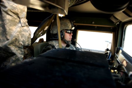 US Navy 080106-N-3385W-001 Personnel Serviceman 2nd Class Cory Ianamoreli, an Individual Augmentee (IA) Sailor attached to Provincial Reconstruction Team Khost, drives a high mobility-purposed wheeled vehicle