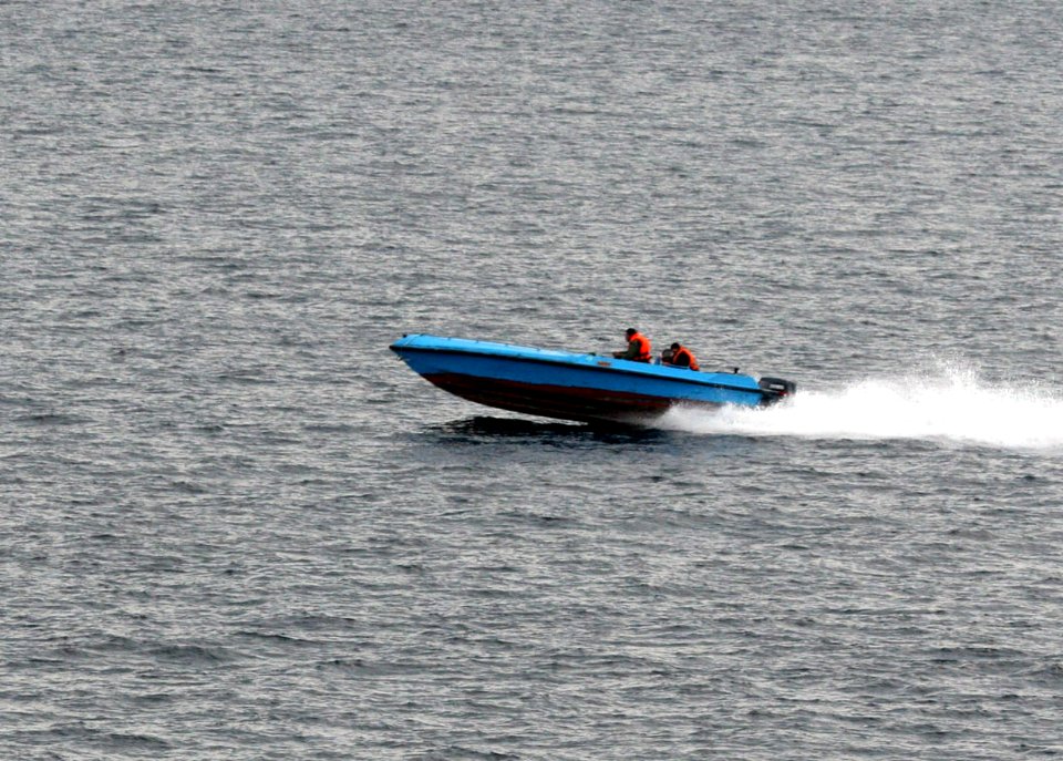 US Navy 080106-N-0000X-007 Small craft suspected to be from the Islamic Republic of Iran Revolutionary Guard Navy (IRGCN), maneuver aggressively in close proximity of U.S. Navy ships